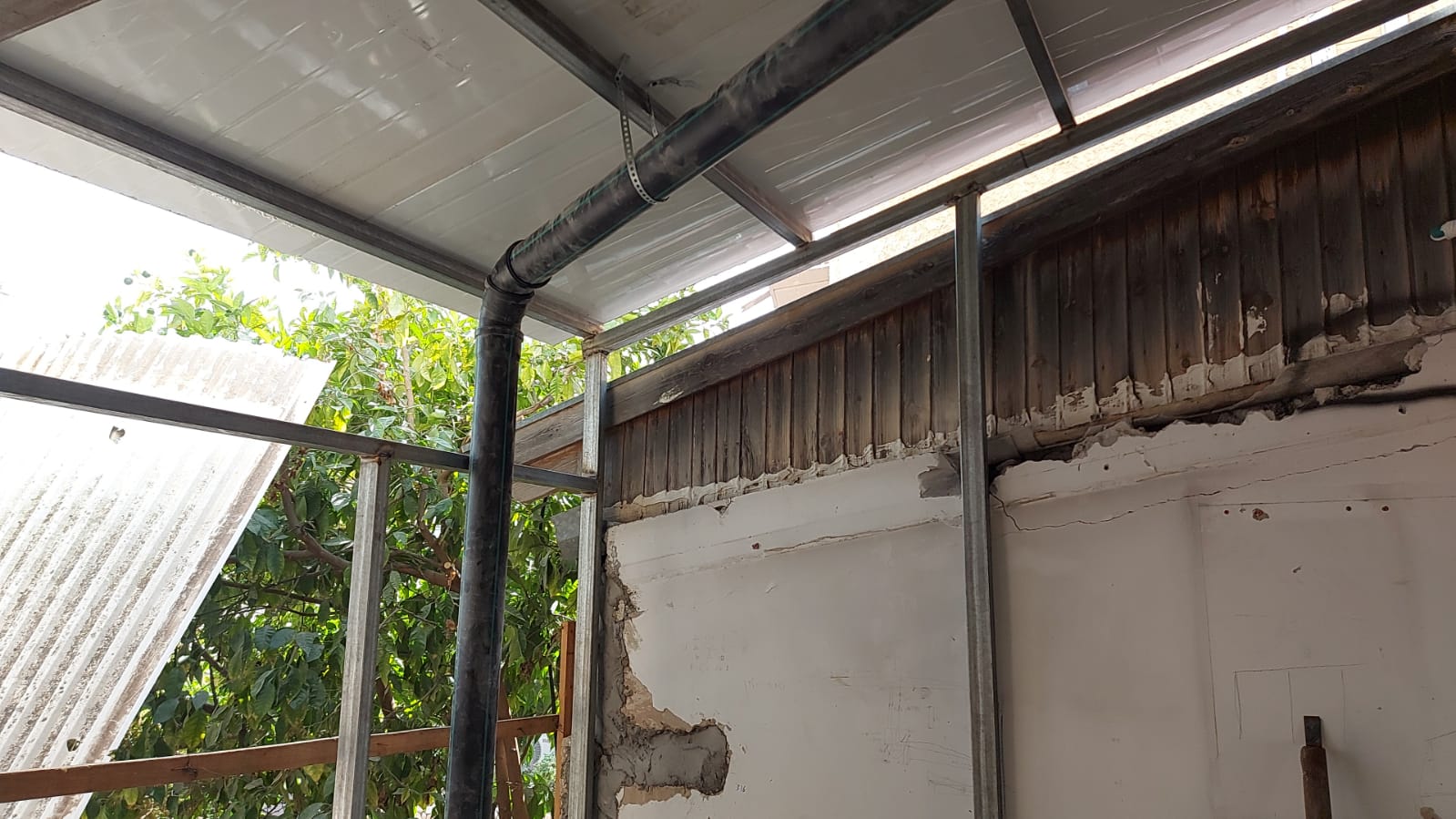 פרויקט תל חי - עבודות בנייה.טיח.אינסטלציה.ביוב.שונות